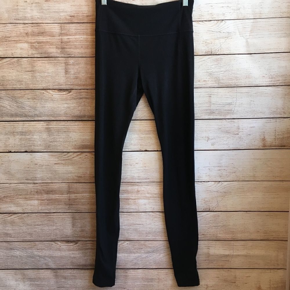 ‎ATHLETA CHATURANGA LEGGINGS WITH HEEL HOLES